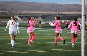 The Jacks’ Arlene Bolanos (7) celebrates with her teammates after scoring against Prosser on Tuesday.