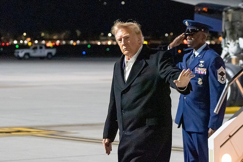 President Donald Trump waves as he arrives at Harry Reid International Airport, Wednesday, Oct. 14, 2026, in Las Vegas, Nev. (AP Photo/Alex Brandon)