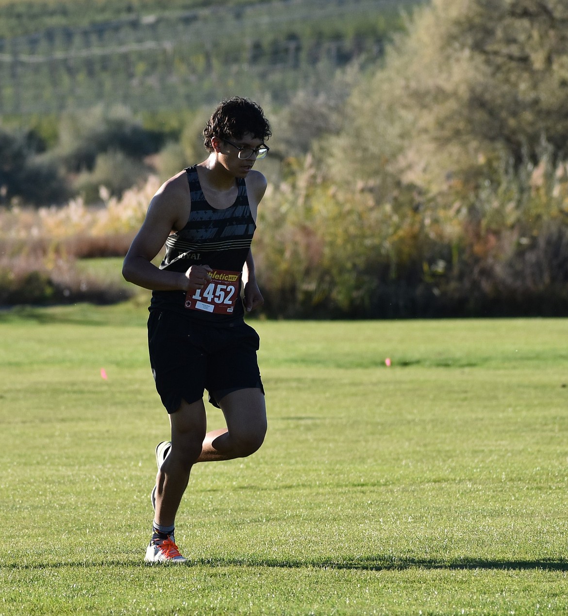 Knights senior Ricardo Garcia prepares to run his final loop around Royal City Golf Course during the SCAC meet.