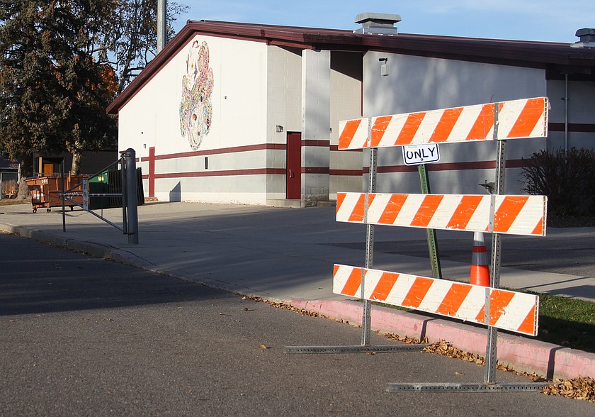 New type three barriers are planted outside Lavina Avenue after a driver drove through two closed crossing gates outside Washington Elementary.