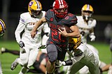 Lewiston overwhelms Sandpoint in IEL showdown, 42-35