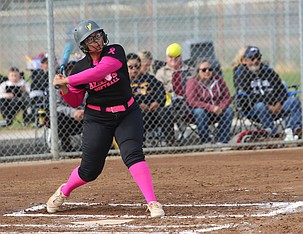The Mavs’ Amelia Avalos (25) eyes the ball as she takes her swing. The Mavericks suffered a season ending 22-18 loss to the West Valley Rams on Saturday.