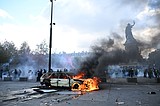 Clashes, fires and looting break out as protesters rally across France, joining students