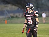 Warriors remain unbeaten behind Grindy’s five touchdown game