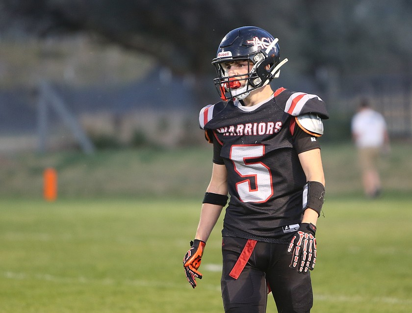The Warriors’ Trey Kast (5) lines up on defense during a previous game this season. The Almira/Coulee-Hartline Warriors won their seventh straight with a 58-6 rout over Wilbur-Creston-Keller on Friday.