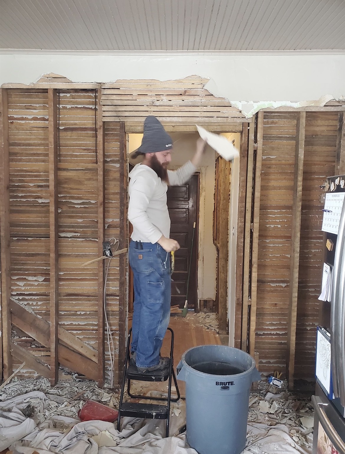 Orr's son Clay doing demo work inside the house.