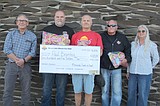 Moses Lake Classic Car Club donates to Moravida Festival trunk or treat