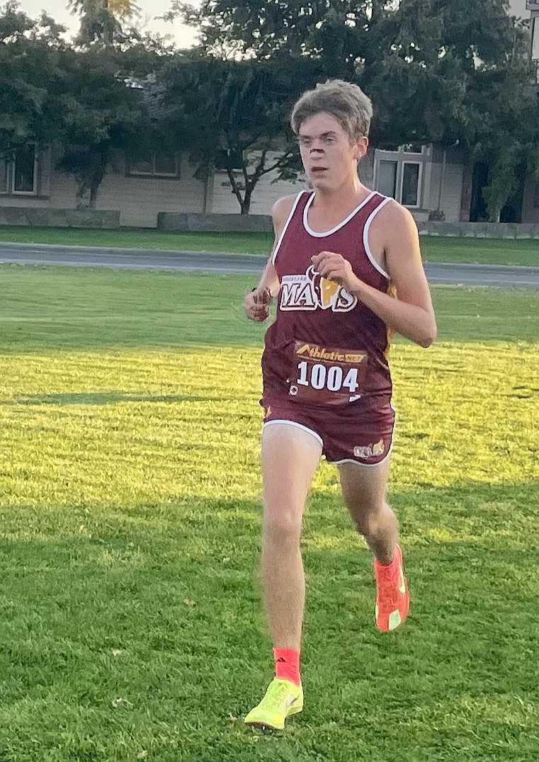 Lane Christensen from MLHS finishes the race in fourth during Tuesday's meet in Wenatchee.