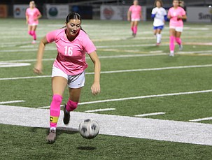 The Mavs' Kamery Char (16) pushes the ball upfield to help Moses Lake advance their attack against Eisenhower on Tuesday.