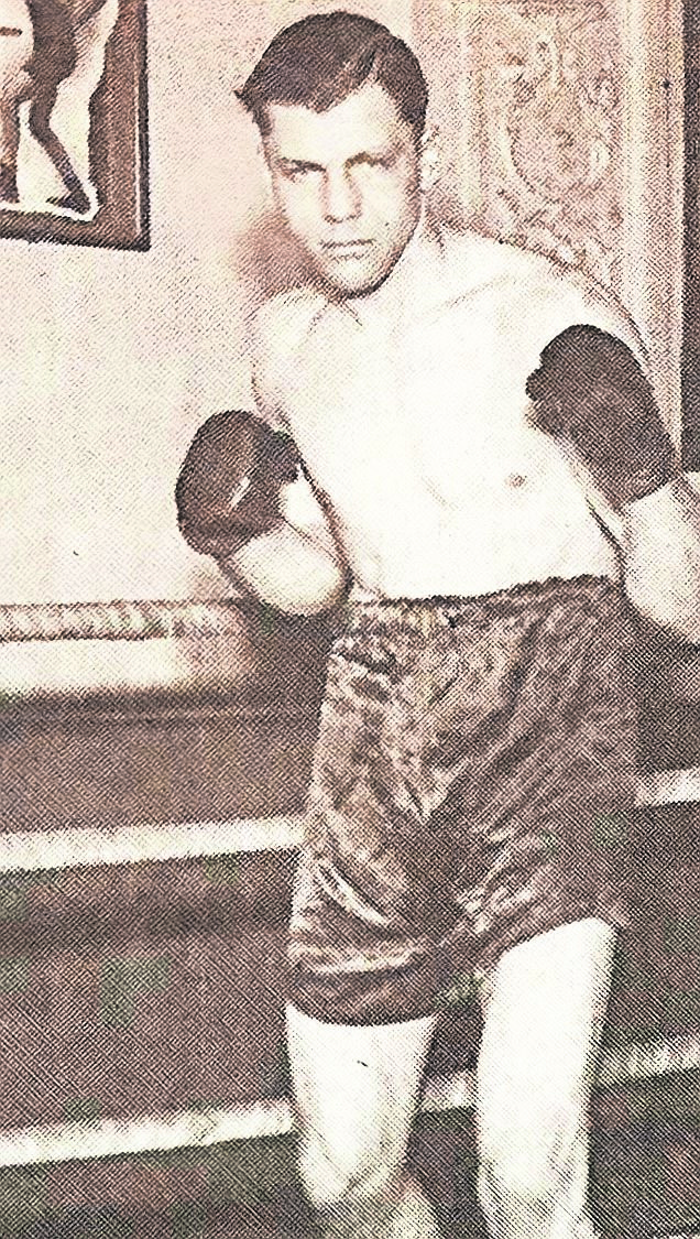 In 1932, boxer Larry Udell posed for a publicity photo, two years before boxing Joe Louis, the legendary heavyweight champion.