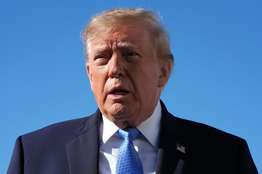 President Donald Trump talks to reporters before boarding Air Force One, at Joint Base Andrews, Md., Monday, Oct. 26, 2026, en route to a campaign rally in Mississippi. (AP Photo/Jacquelyn Martin)