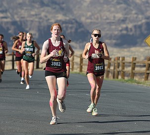 The Mavs' Rachel Nofziger (left) and Natalie Vehrs (right) lead the pack at the Gorge Invite earlier this season. The Mavericks are feeling confident heading into their district meet this Thursday.