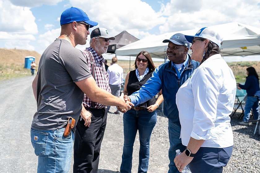 Former National Resource Conservation Service Terry Crosby, second from right, meets landowners from the EL 22.1 area, federal and state officials during a 2023 visit.