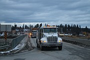 Friends and loved ones sound their horns as they pass Stimson Lumber in Priest River after taking their logging trucks on the road Saturday to pay tribute to Pat Mason, a longtime logger who died in a logging accident on Nov. 5