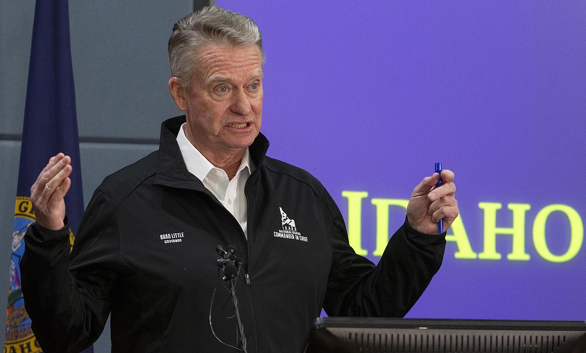 In this March 25 photo, Idaho Gov. Brad Little speaks at a news conference in Boise and issues a statewide stay-at-home order in efforts to prevent the spread of the coronavirus.